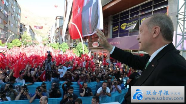 Mr Erdogan speaks to a crowd
