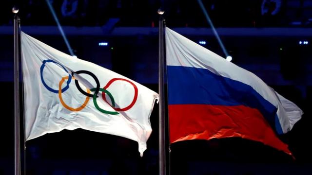 Olympic and Russian flags